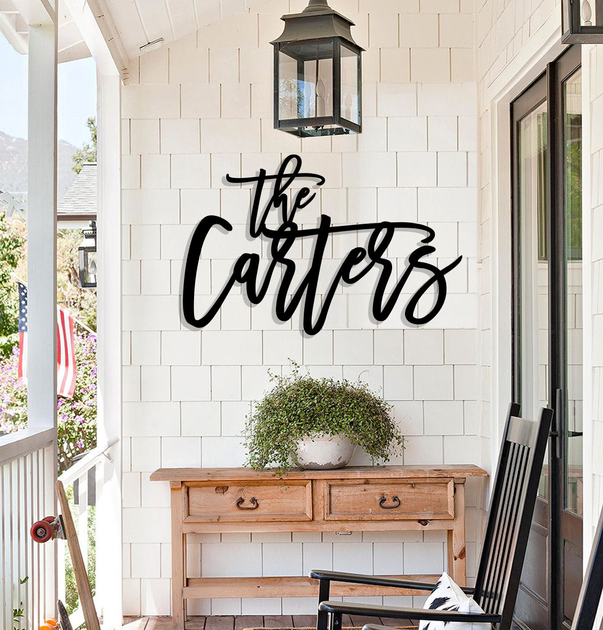 a porch with a chair and a table on it
