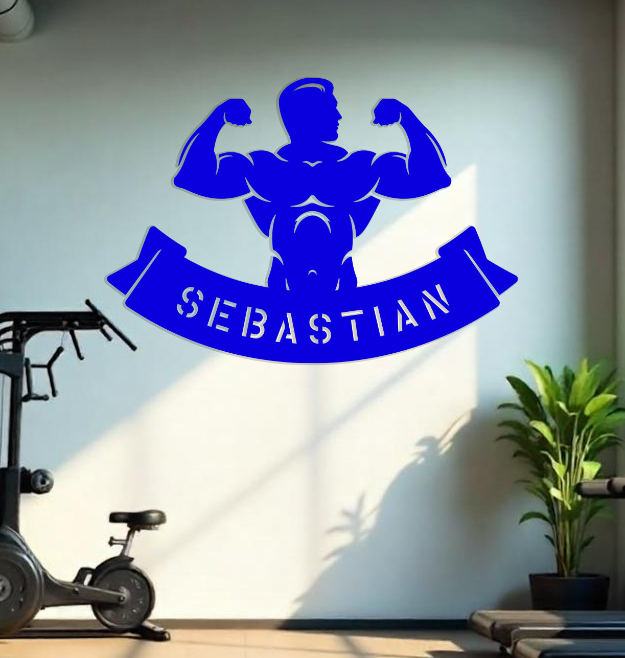 a gym room with a wall decal that says sebastian