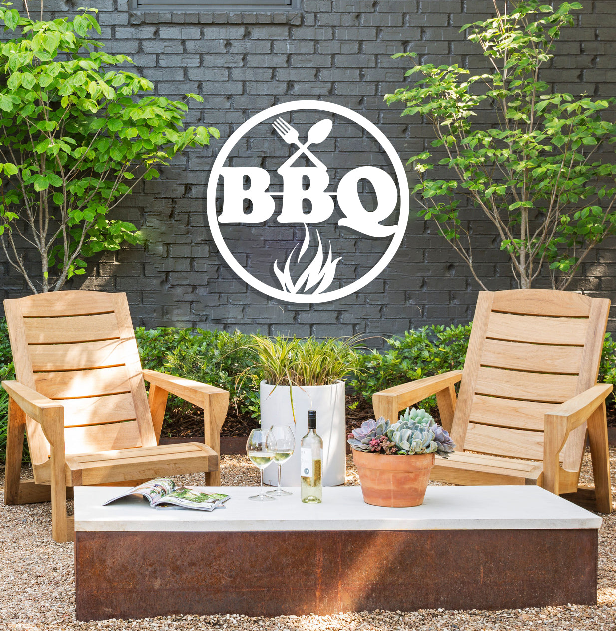 a couple of chairs sitting in front of a bbq sign