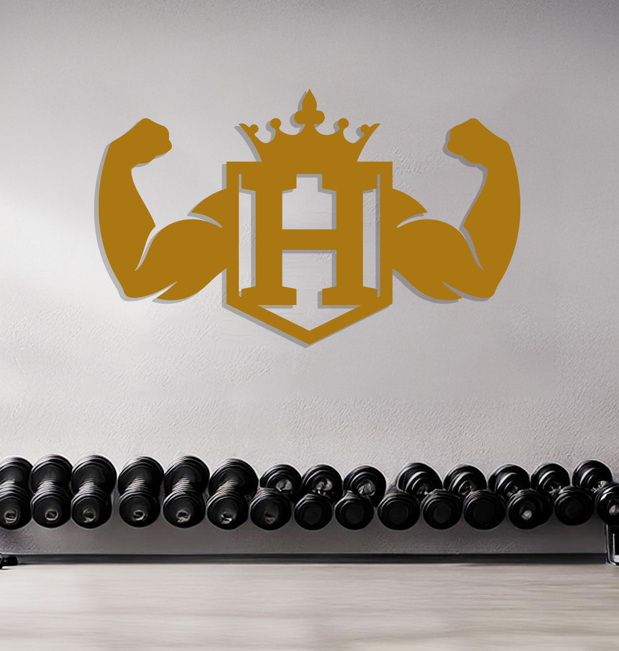 a gym room with a wall with a logo on it