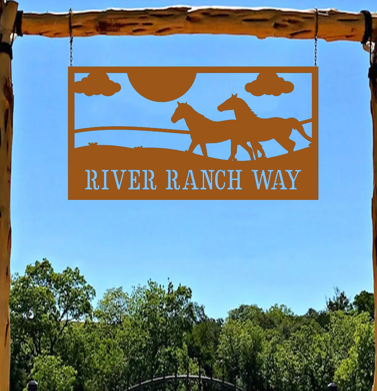 a sign for a ranch with horses on it