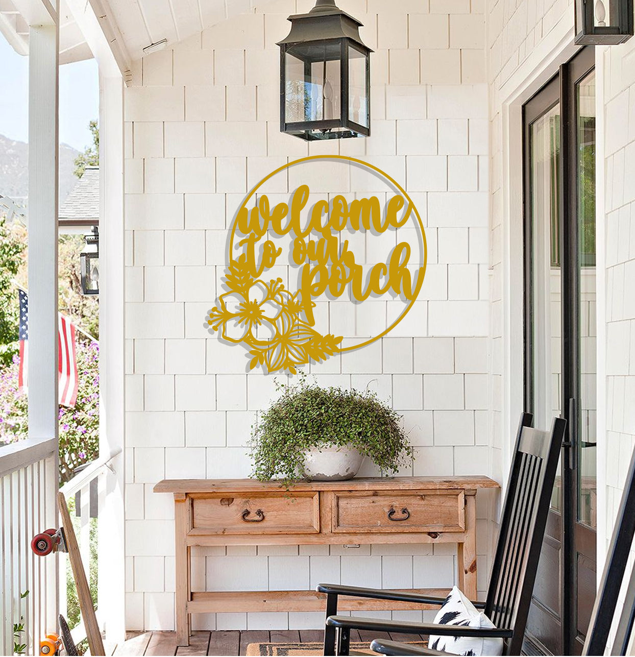 a welcome sign on the front porch of a house