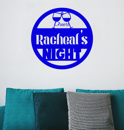 a couch with a pillow and a wall sticker on it