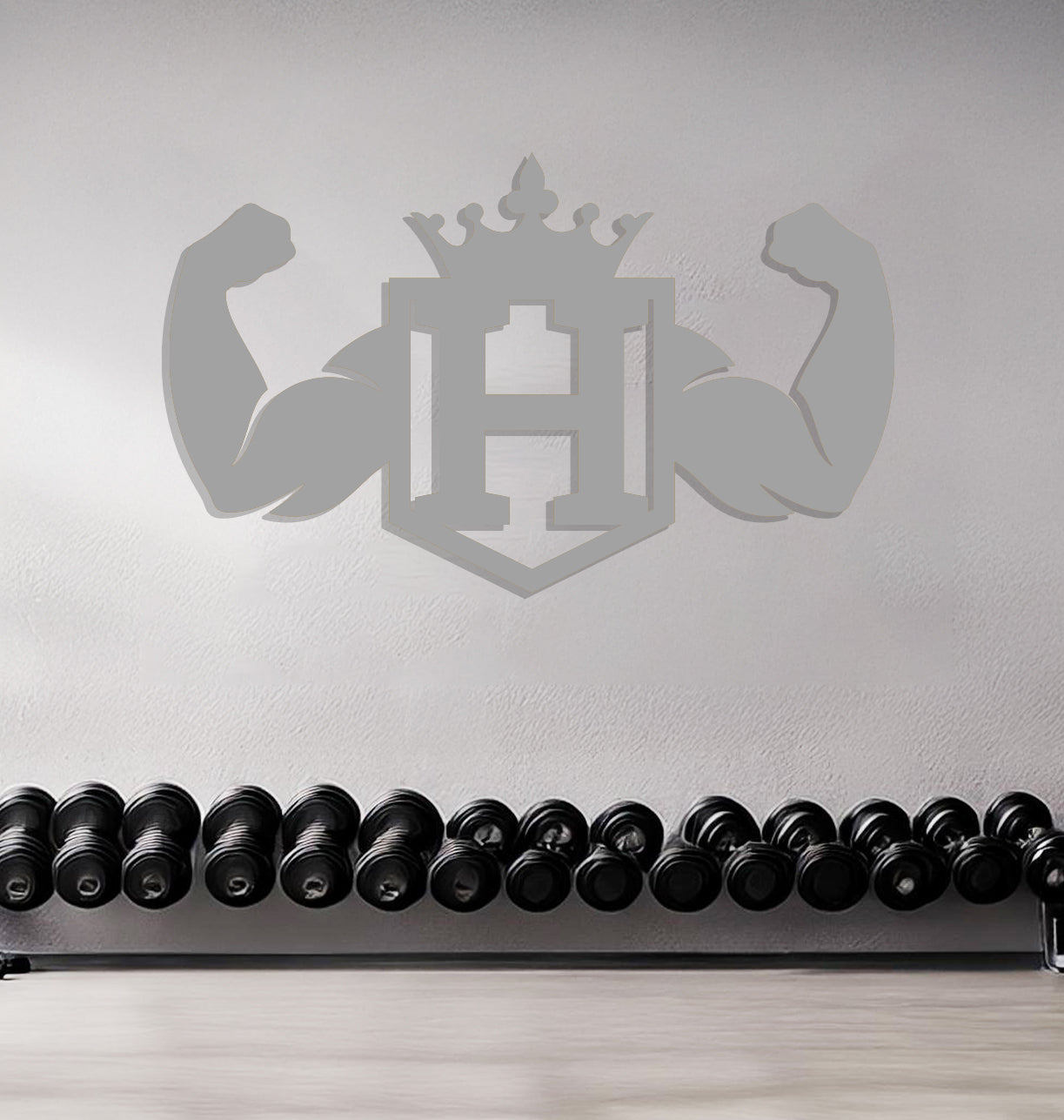 a row of kettles sitting in front of a wall with a crown on it