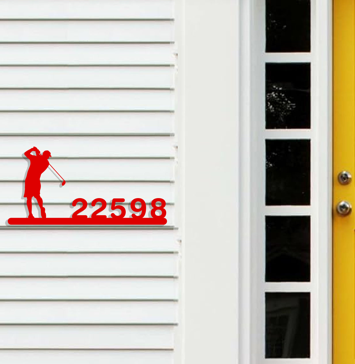 a yellow door with a red sign on it