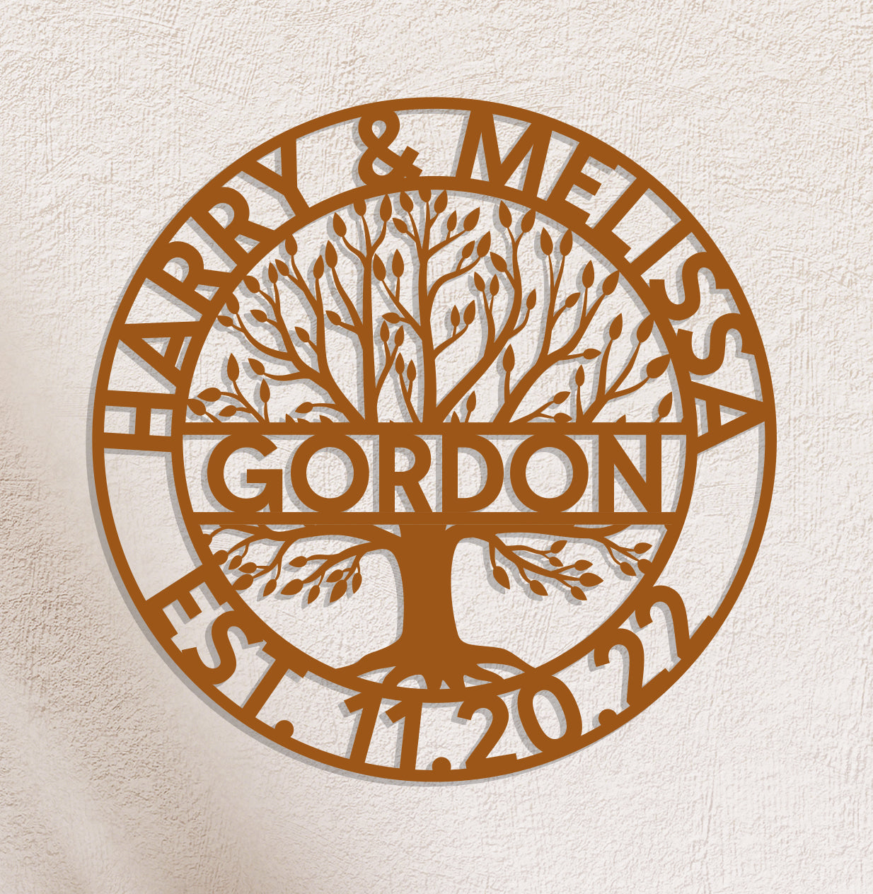 a circular metal sign with a tree on it