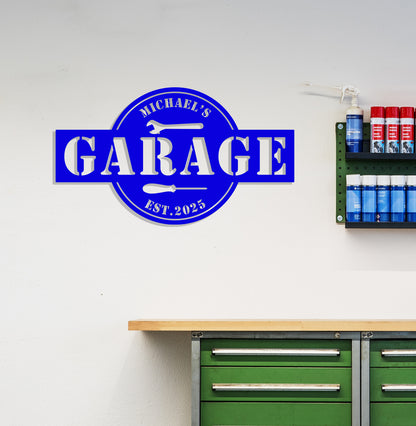 a garage sign mounted to the side of a wall