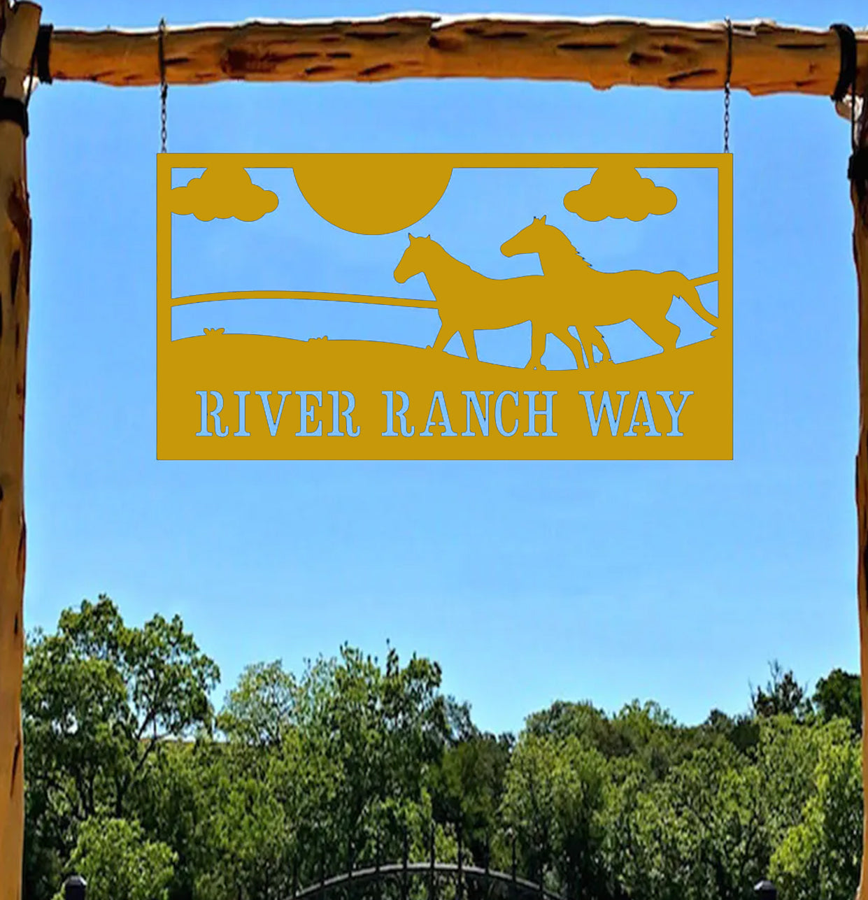 a sign that says river ranch way hanging from a wooden frame