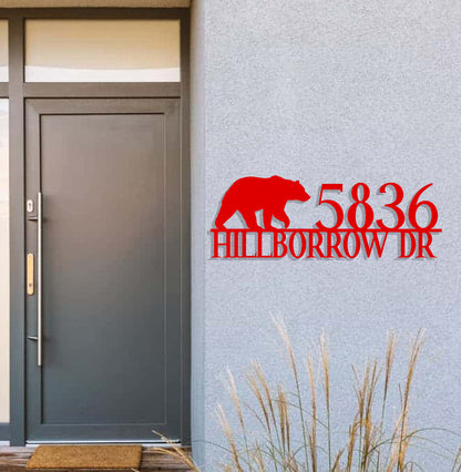 a door with a sign that says 3508 hillbrorow dr