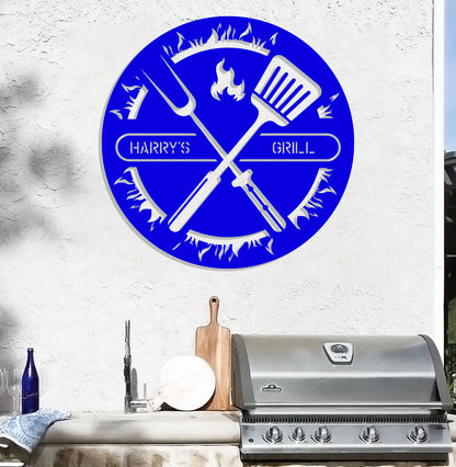 a blue circle with the words happy's grill and a grilling utens