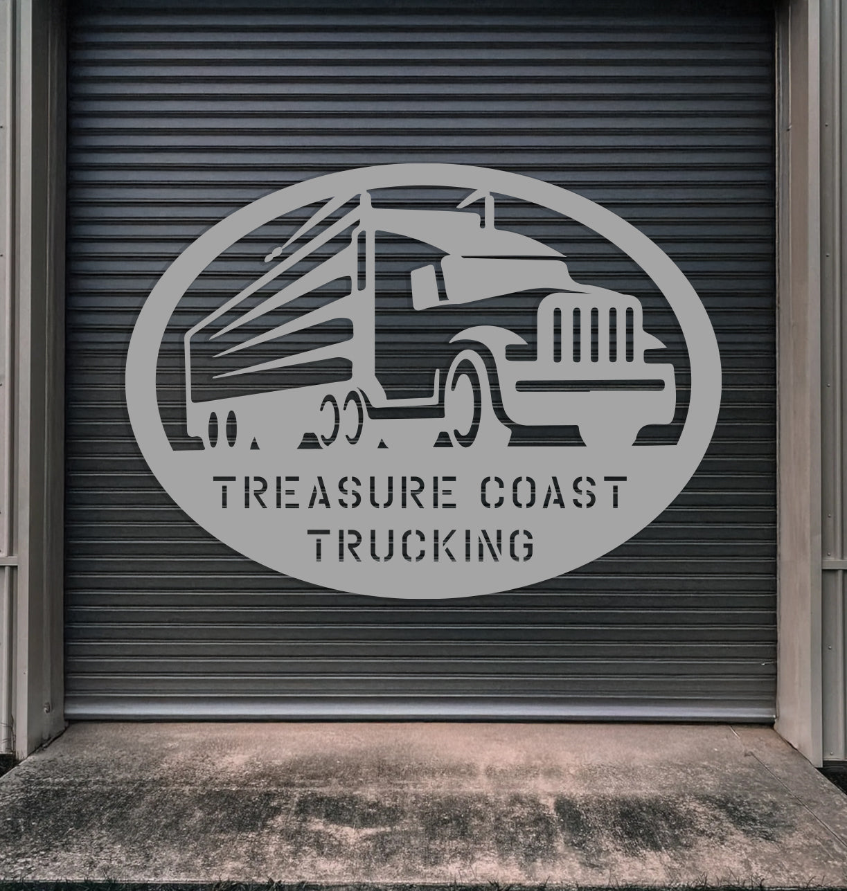 a sign on the side of a building that says, treasures coast trucking