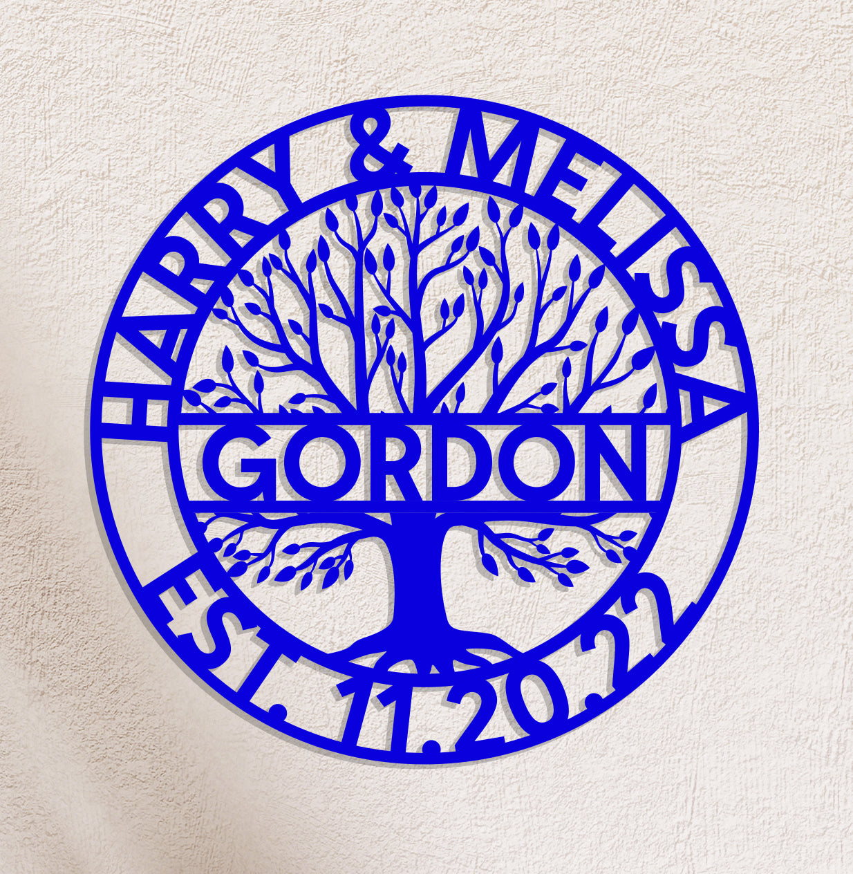 a blue circular metal sign with a tree on it